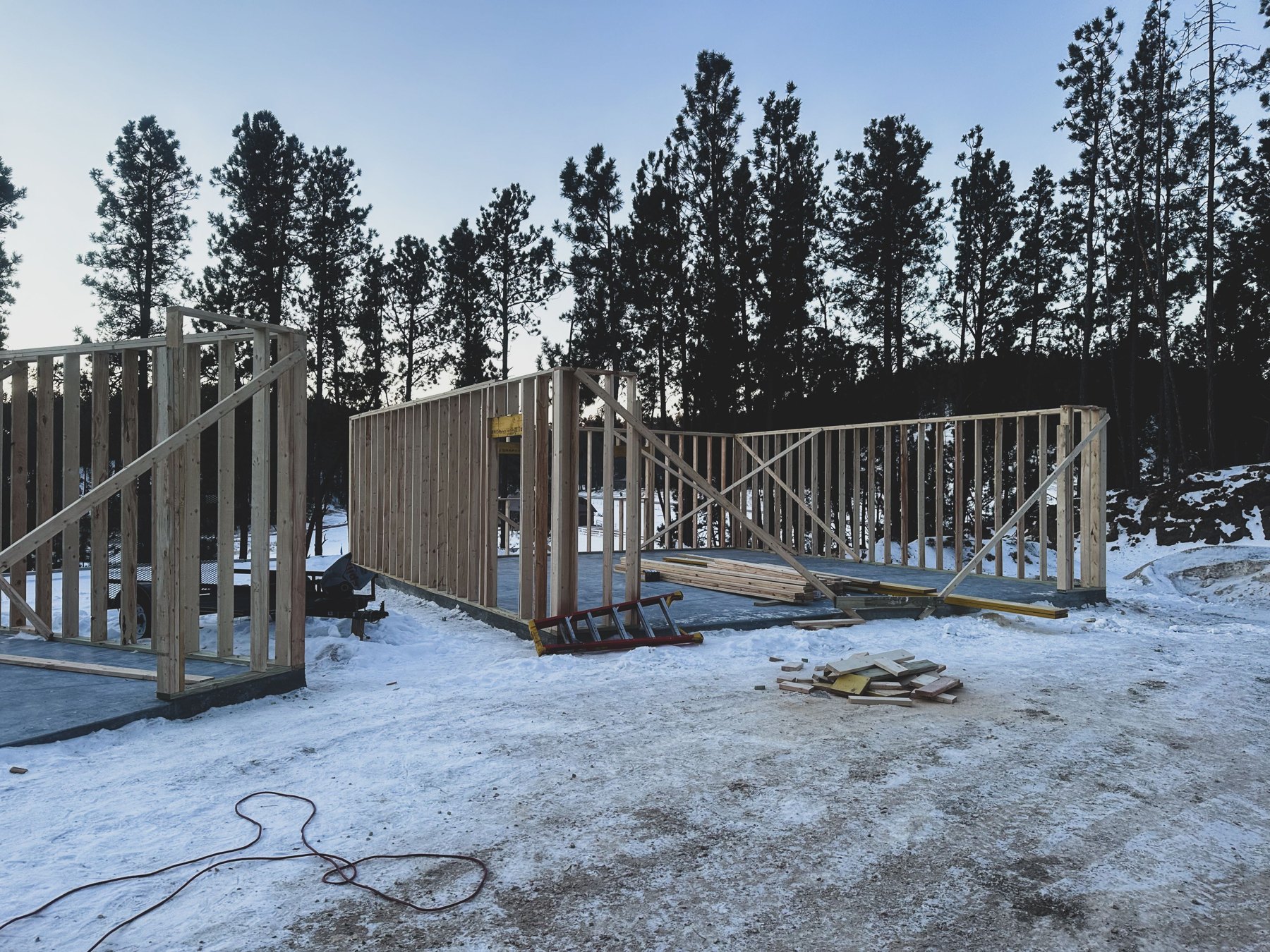 Real timber framing being assembled at a construction site